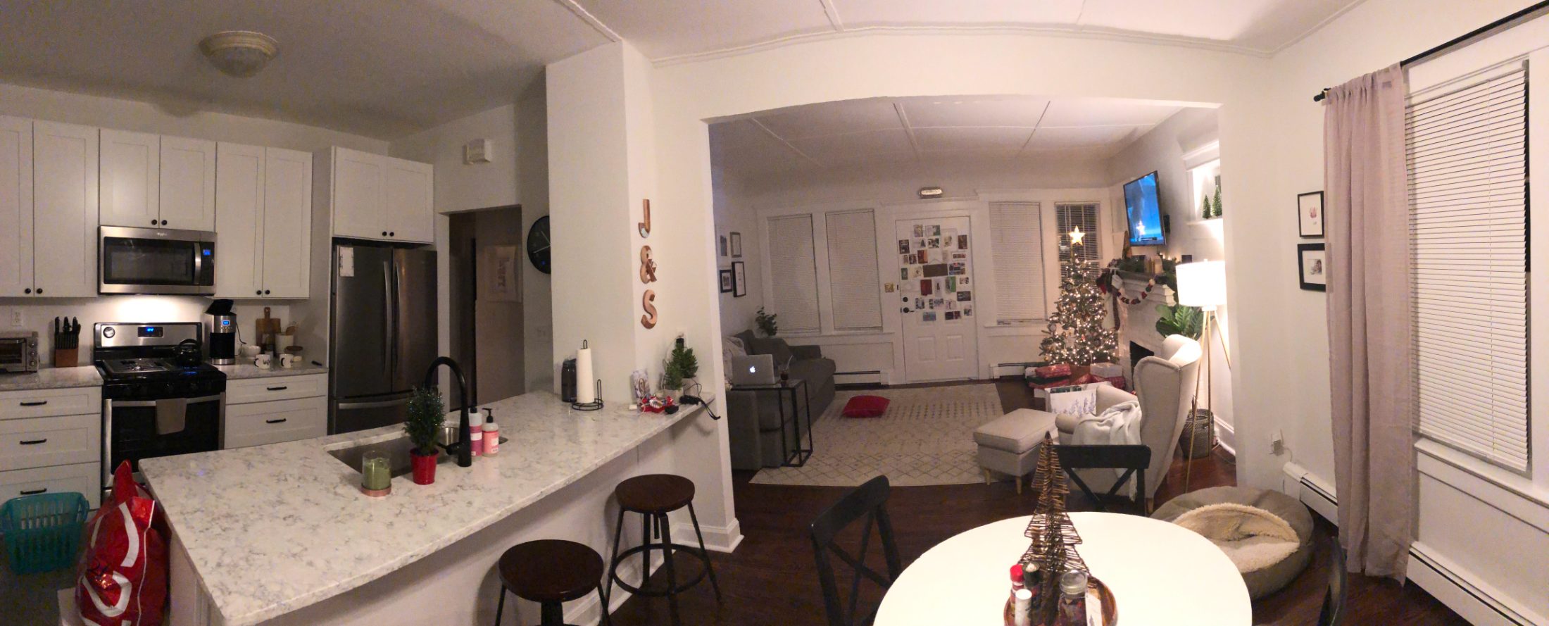 Christmas at the Western Ave house, with the tree up in the front room and presents under the mantel.