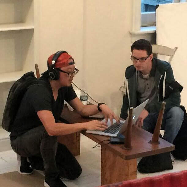 Justin reviewing edits on a laptop with director Joseph Kahn on the Blank Space set.